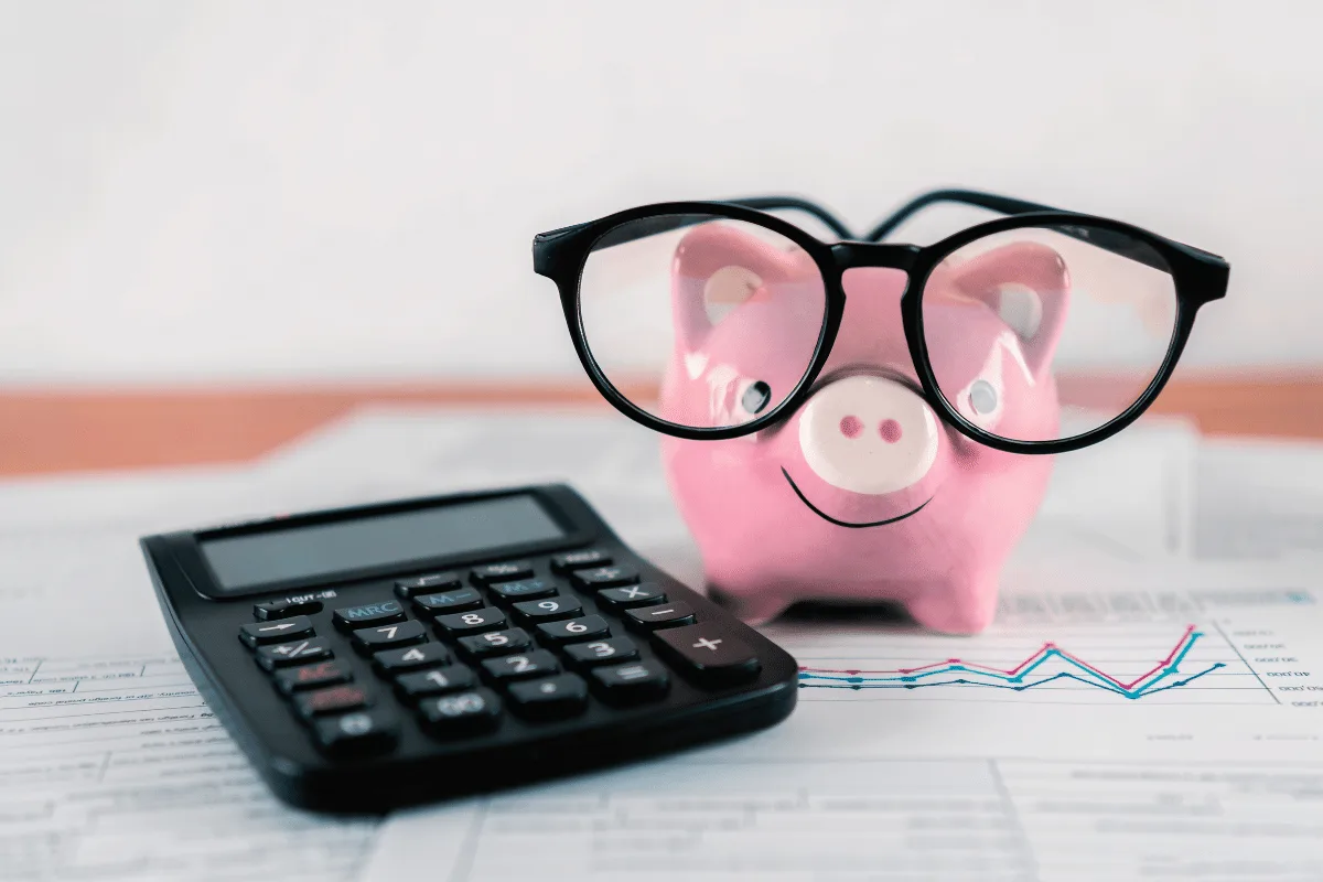 Business owner comparing virtual assistant pricing options and budgeting for administrative support