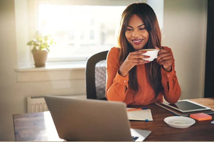 Team members collaborating remotely using coaching software for better communication and productivity