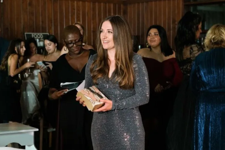 Amber Gray, Trusty Oak founder, receiving Austin Business Woman of the Year 2021 award